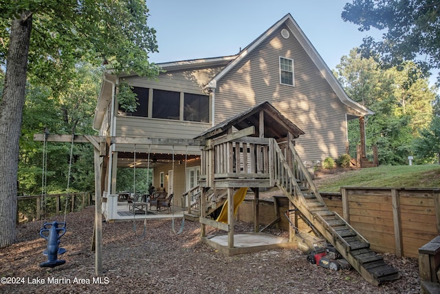 back of house with a patio