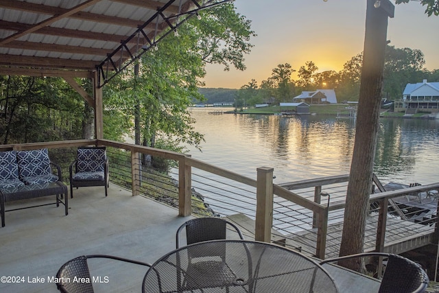 dock area with a water view