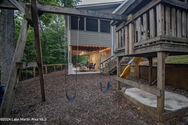 exterior space featuring a patio area and a sunroom