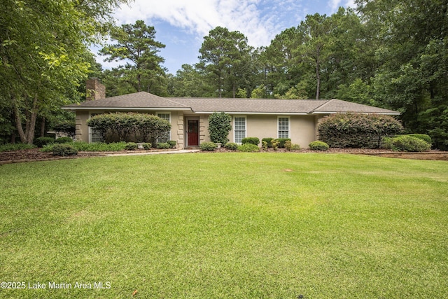 970 Raintree Dr, Alexander City, AL 35010 - single story home with a chimney and a front lawn