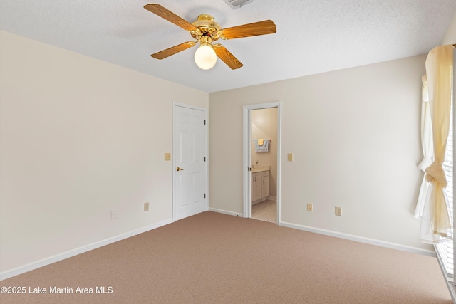 970 Raintree Dr, Alexander City, AL 35010 - unfurnished bedroom with light carpet, ensuite bathroom, and ceiling fan