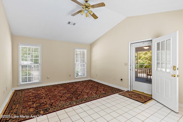 970 Raintree Dr, Alexander City, AL 35010 - spare room featuring vaulted ceiling, ceiling fan, and light tile patterned floors