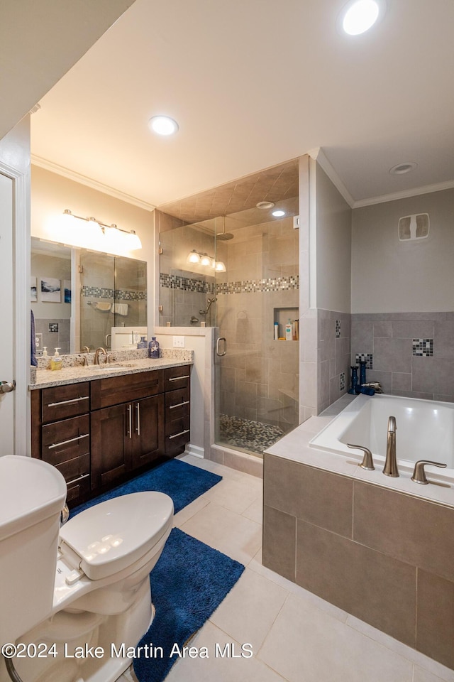 full bathroom with tile patterned floors, ornamental molding, vanity, plus walk in shower, and toilet