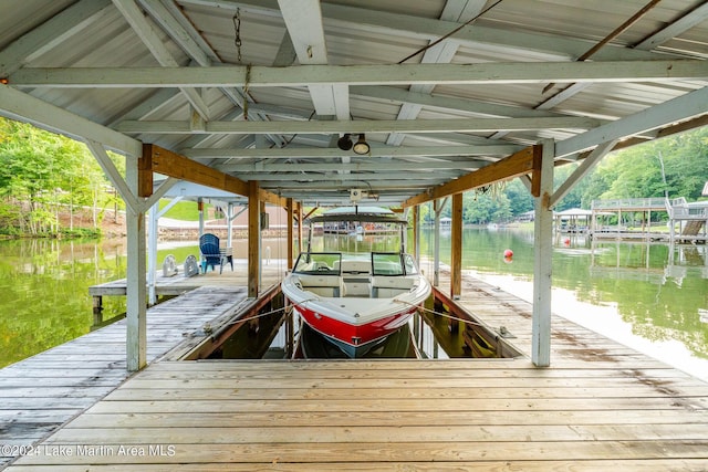 dock area featuring a water view