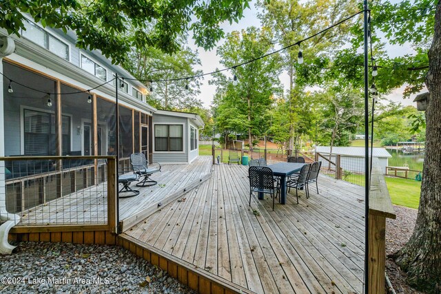 deck with a sunroom