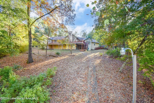 single story home featuring a deck