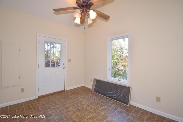 doorway to outside with plenty of natural light and ceiling fan