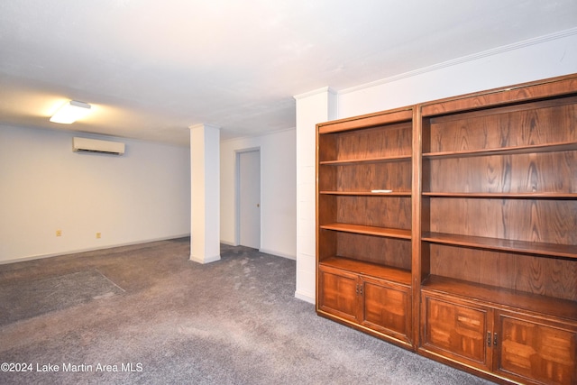 basement with carpet flooring and a wall unit AC