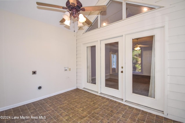 interior space featuring french doors, vaulted ceiling, and ceiling fan