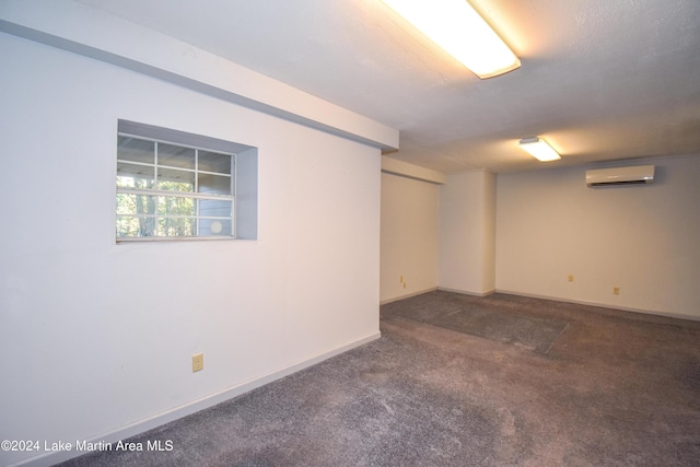 basement featuring carpet flooring and a wall mounted air conditioner