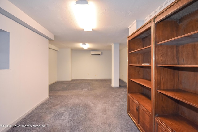 basement featuring carpet flooring and a wall mounted AC