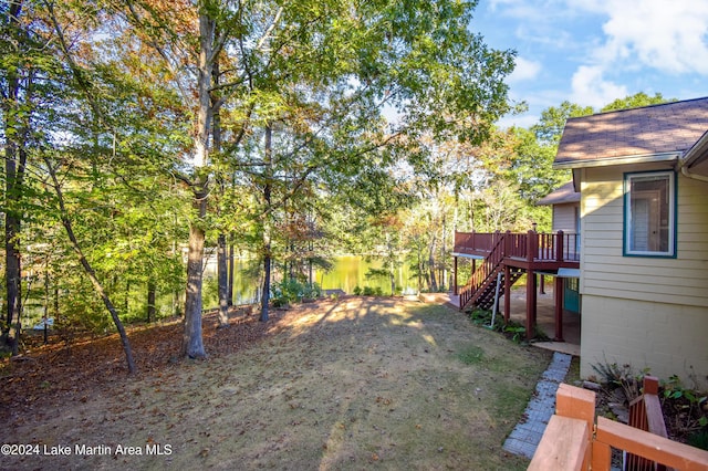 view of yard with a wooden deck