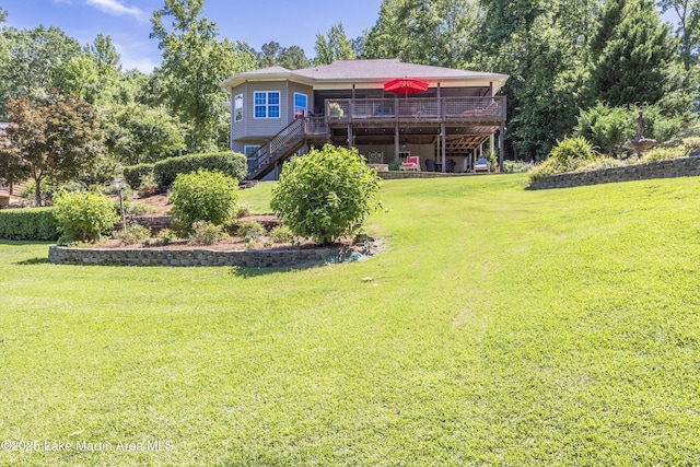 314 Daine Dr, Jacksons Gap, AL 36861 - rear view of property with stairway, a deck, and a yard