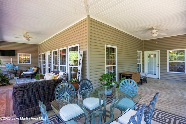 314 Daine Dr, Jacksons Gap, AL 36861 - wooden deck featuring a ceiling fan, outdoor dining space, and an outdoor hangout area