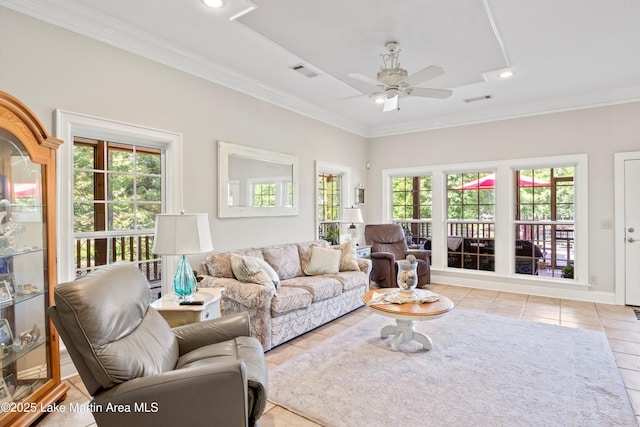 314 Daine Dr, Jacksons Gap, AL 36861 - living room featuring a ceiling fan, plenty of natural light, light tile patterned floors, ornamental molding, and recessed lighting