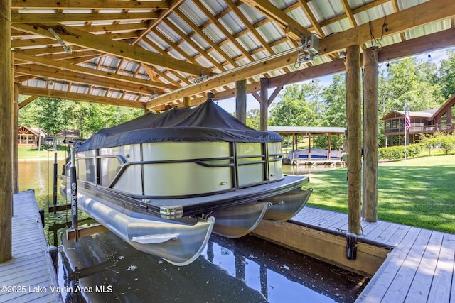314 Daine Dr, Jacksons Gap, AL 36861 - dock featuring boat lift and a lawn