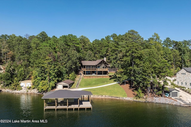 drone / aerial view with a water view