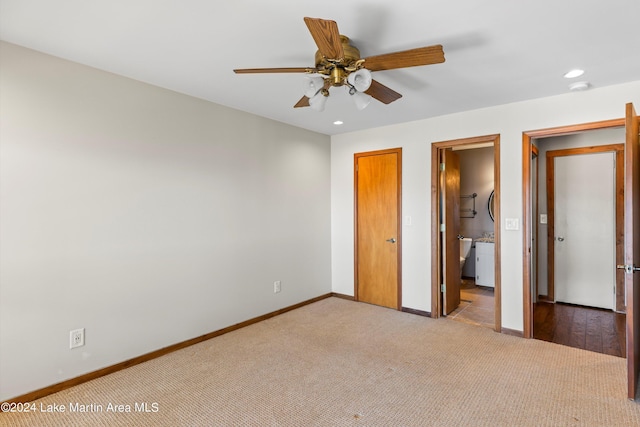 unfurnished bedroom with ensuite bathroom, a ceiling fan, recessed lighting, carpet, and baseboards