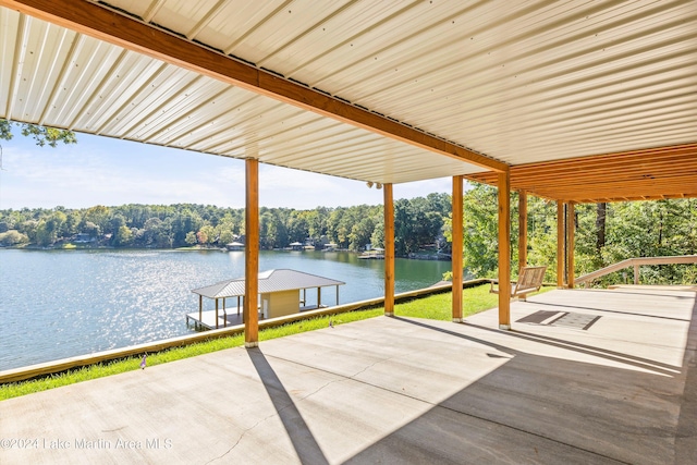 view of patio featuring a water view