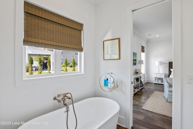 302 Williams Rd, Alexander City, AL 35010 - full bathroom with baseboards, ornamental molding, a soaking tub, recessed lighting, and wood finished floors