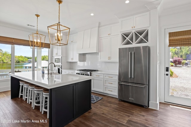 302 Williams Rd, Alexander City, AL 35010 - kitchen featuring a chandelier, an island with sink, light countertops, visible vents, and stainless steel appliances