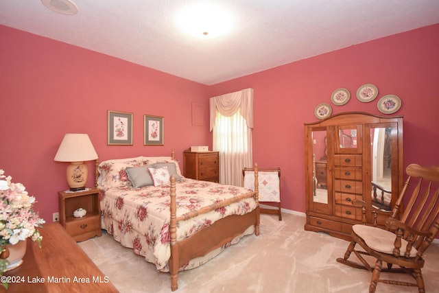 bedroom with light colored carpet