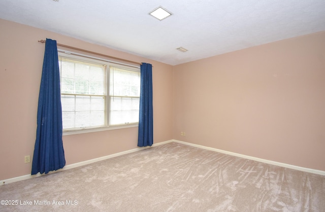 2130 Skylark Dr, Alexander City, AL 35010 - carpeted spare room featuring baseboards