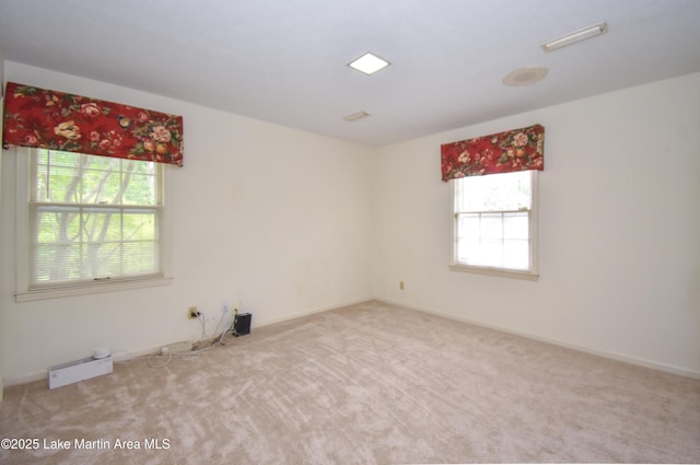 2130 Skylark Dr, Alexander City, AL 35010 - carpeted empty room with healthy amount of natural light and baseboards