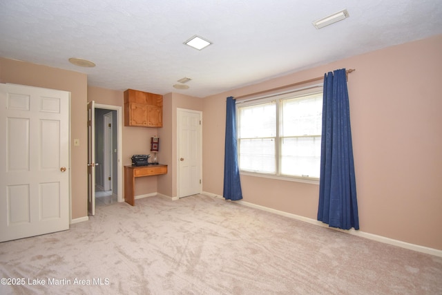 2130 Skylark Dr, Alexander City, AL 35010 - unfurnished room with light colored carpet and baseboards