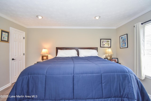 bedroom featuring crown molding, baseboards, recessed lighting, and wood finished floors