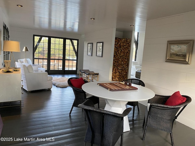 dining room with dark hardwood / wood-style floors