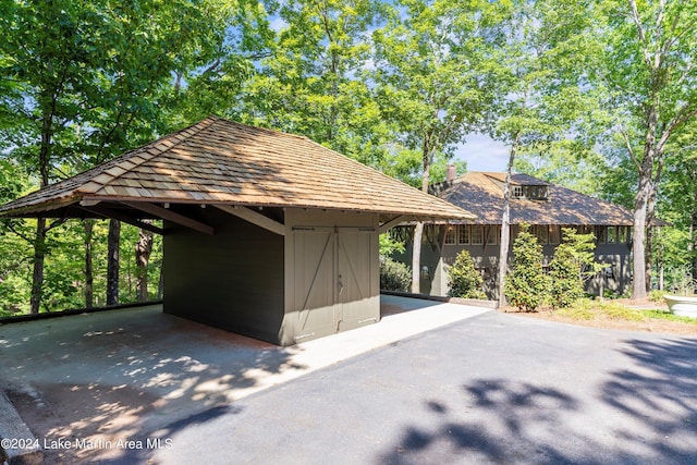 view of parking with a carport