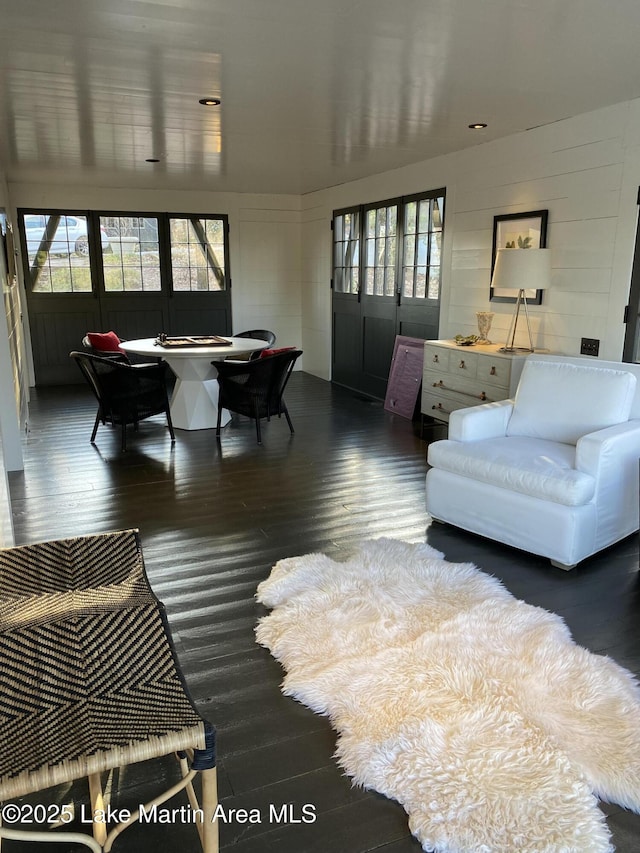 living room with dark wood-type flooring