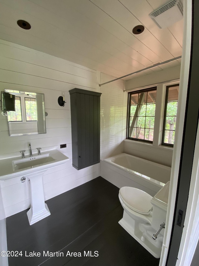 bathroom featuring sink and toilet