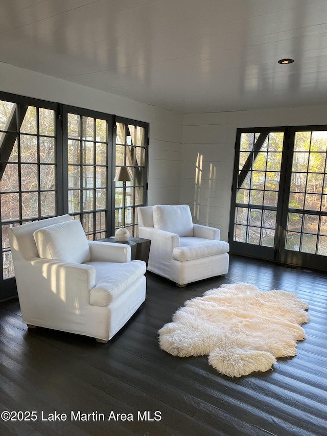 living room featuring dark wood-type flooring