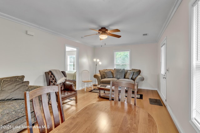 72 Christopher Cir, Alexander City, AL 35010 - living area featuring ceiling fan, light wood finished floors, and crown molding