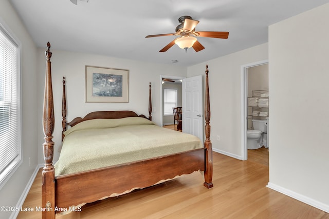 72 Christopher Cir, Alexander City, AL 35010 - bedroom with light wood-style flooring, ceiling fan, and ensuite bathroom
