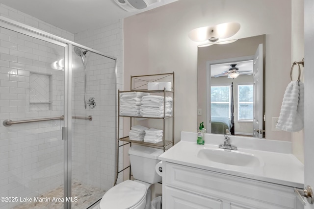 72 Christopher Cir, Alexander City, AL 35010 - ensuite bathroom with a ceiling fan, vanity, and a shower stall