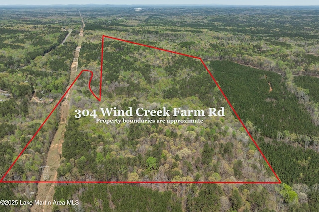 304 Wind Creek Farm Rd, Alexander City, AL 35010 - drone / aerial view featuring a forest view