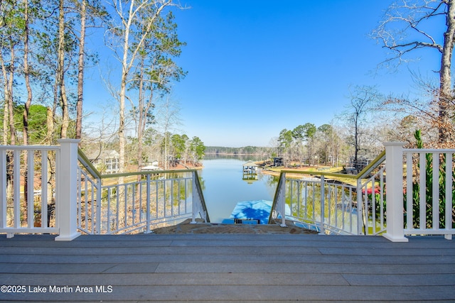 dock area with a water view