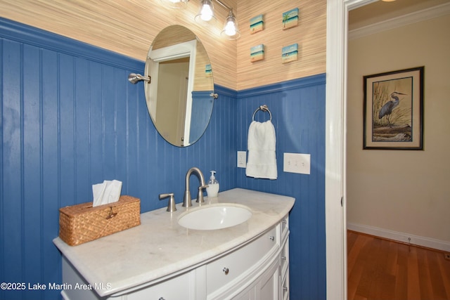 bathroom featuring vanity and wood finished floors