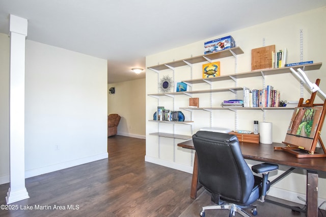 office area featuring baseboards and wood finished floors