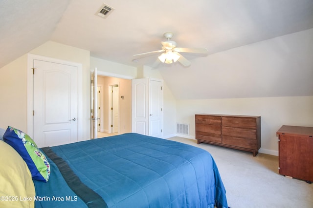 bedroom with visible vents, baseboards, carpet, and ceiling fan