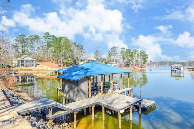 dock area featuring a water view and boat lift