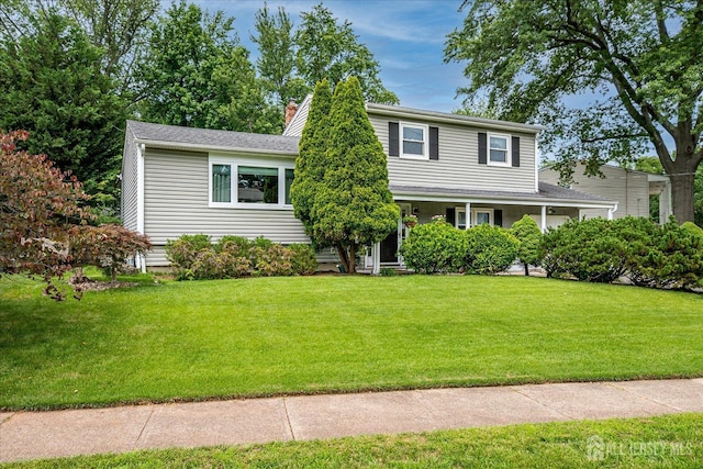 6 Zaydee Dr, Edison, NJ 08837 - view of front facade with a front yard and a chimney