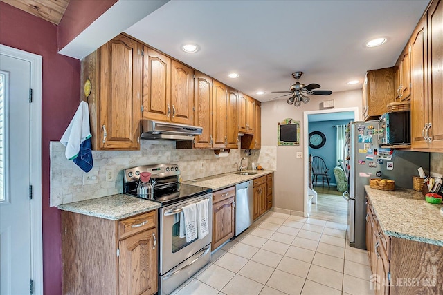 6 Zaydee Dr, Edison, NJ 08837 - kitchen featuring appliances with stainless steel finishes, under cabinet range hood, ceiling fan, backsplash, and light tile patterned floors