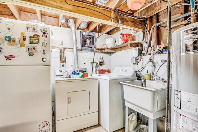 6 Zaydee Dr, Edison, NJ 08837 - laundry area featuring water heater, washing machine and clothes dryer, and concrete block wall
