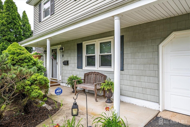 6 Zaydee Dr, Edison, NJ 08837 - property entrance featuring a porch and a garage