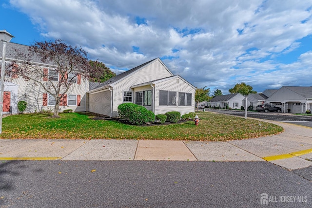 view of front of home with a front yard