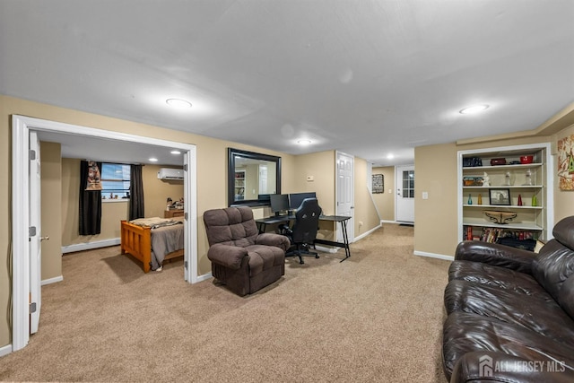 living room featuring an AC wall unit, carpet floors, an office area, baseboards, and baseboard heating